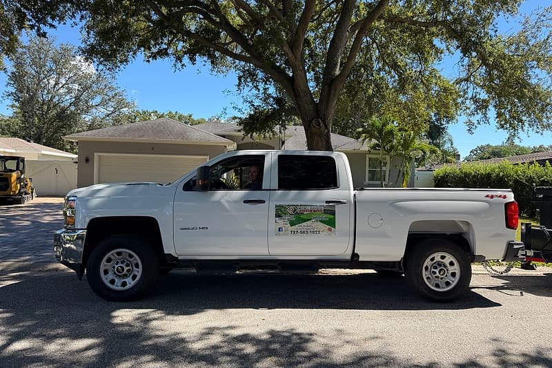Nathell Services work truck parked on a residential street